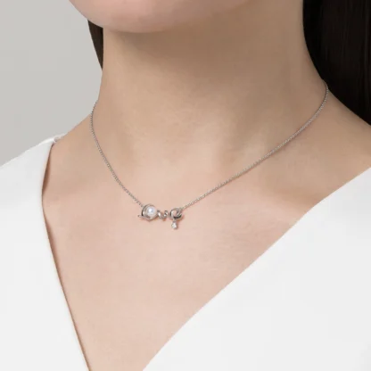 Akoya Cultured Pearl Love Pendant in 18k White Gold - on the neck