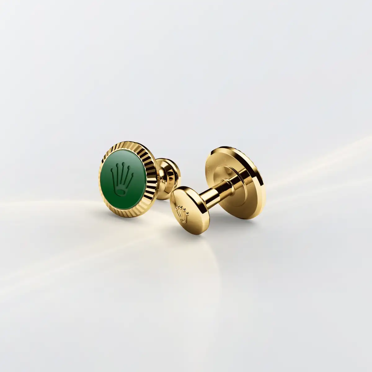 Rolex ‘Fluted’ cufflinks in Yellow gold and ceramic 18 ct yellow gold Cerachrom circle in green ceramic, a1038 at Montecristo Jewellers